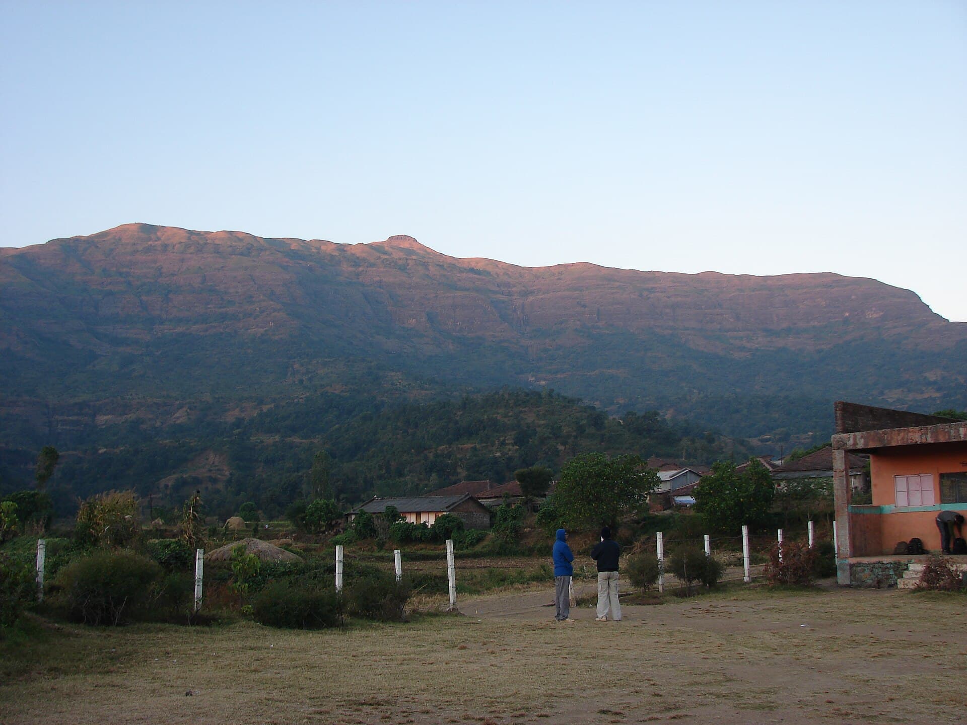 Kalsubai peak rising above the surrounding hills, seen from the base