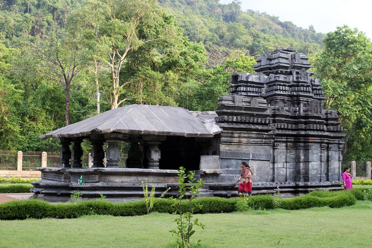Front view of the Mahadev Temple's carved basalt facade at Tambdi Surla