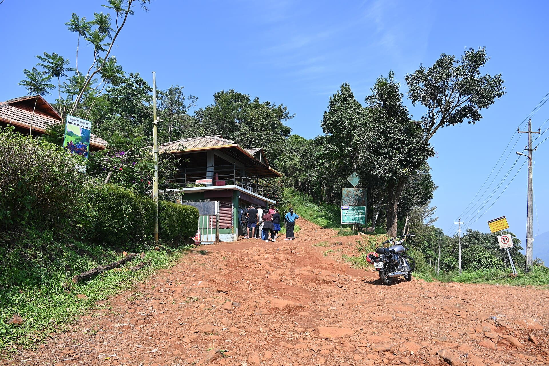 Grassy summit ridgeline of Tadiandamol with sweeping views over Coorg's hills